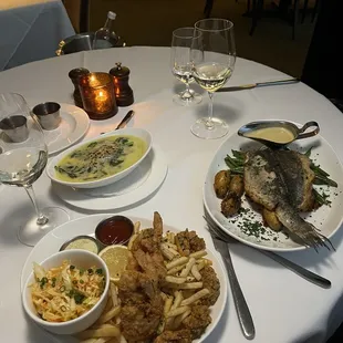 Fried shrimp and oysters, creamed spinach, Branzino fish