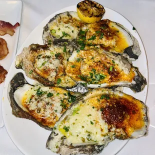 Hors d&apos;Oeuvres:  RC&apos;S CHARGRILLED OYSTERS garlic butter, parmesan