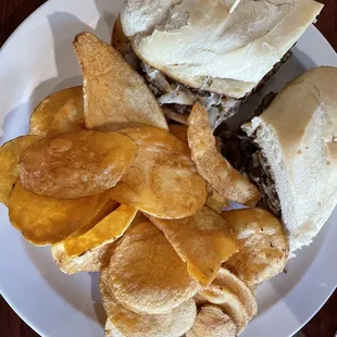 Philly cheesesteak sandwich with Charlie&apos;s chips