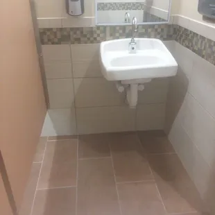 New bathroom tile during a renovation.