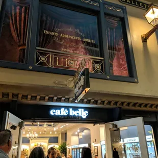 the entrance of a cafe