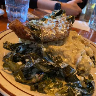Fried chicken, mashed potatoes and collard greens