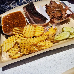 Brisket &amp; Burnt Ends on (the right).  With baked beans and waffle fries.