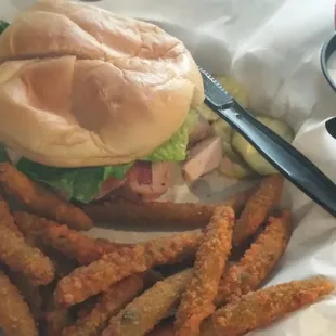 Smoked turkey club with a side of fried green beans.