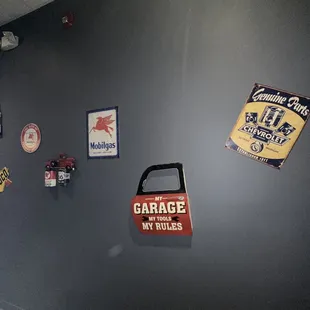 a wall with a variety of signs on it
