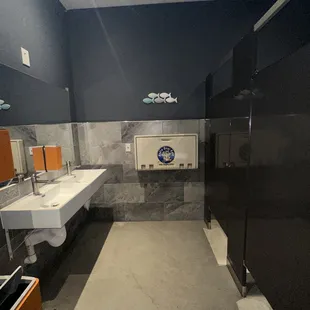 a public restroom with two sinks