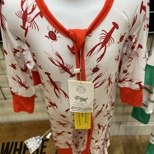 a red and white shirt with lobsters on it
