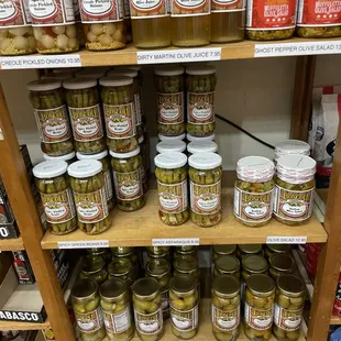 a shelf of pickles