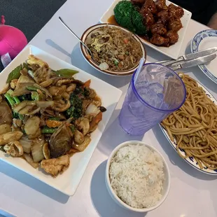 General tsos with pork fried rice and happy family with steamed rice . Lo Mein.