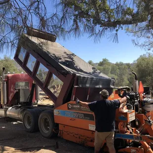 a man working on a truck