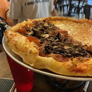Toppings side very generous pepperoni, mushrooms, sausage, and olives