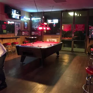 a pool table and bar
