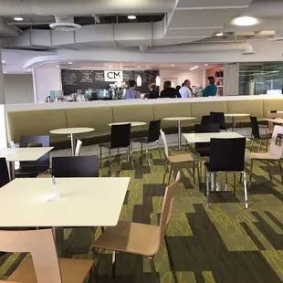 Plenty of seating! C+M is in a corporate environment inside of a building that says 'Marketplace Cafe'