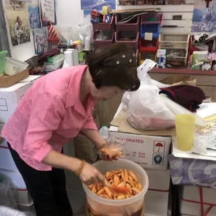 Nice Korean lady with her awesome pickled mango!! She &quot;made special with good mangos&quot;, as she says. You gotta try em!