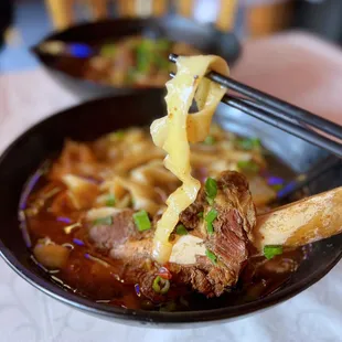 招牌牛小排粉/面/刀削面 House Special Beef Rib Noodle Soup | $16.95 (mildly spicy)