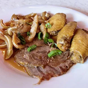 卤味拼盘 Chóngqìng Spice Braised Dish w/ pork intestines, chicken wings, beef shank, pig ear | $12.95