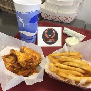 Lunch special #8 - 5 Cr Wings, range fries and a medium green circle is blue cheese and celery-$7.99 plus tax