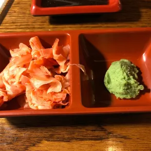 a bowl of noodles and a bowl of guacamole
