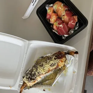 a fish in a styrofoam container