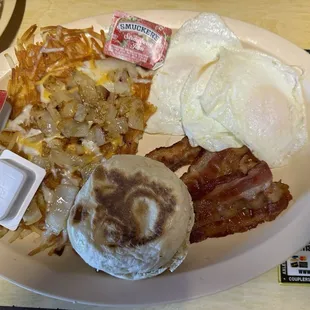 C's hungry Jack, English muffin all bacon and onions and cheese added to the hash browns.