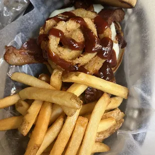 texan burger, 8 OZ burger topped with bacon, cheese, onion rings, and barbecue sauce