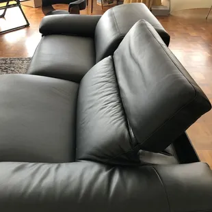 DEFECT noted Left side of couch upon delivery -- headrest has neck roll/lump &amp; armrest wrinkled vs. Right side fine. Only 9 days old.