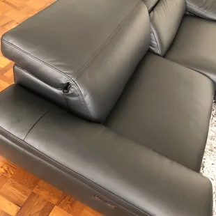 Right side of Natuzzi couch headrest &amp; armrest looks like new?