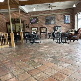 tables, chairs, and a fireplace