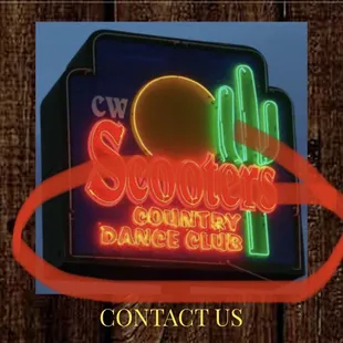 a neon sign for a dance club