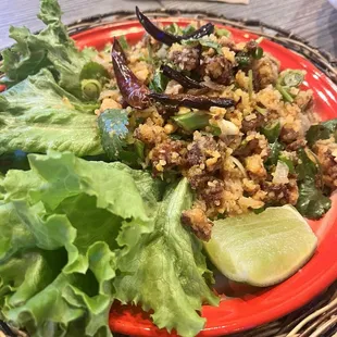 Nam Khao: Crispy rice and cured pork