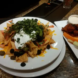 Nachos and wings, $11 and $10