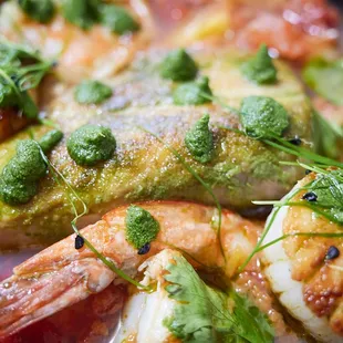 "C4 table Asian cioppino" - mahi mahi, shrimp, Hokkaido scallop, clams in a spicy aromatic tomato lemongrass broth, Asian pesto