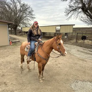 Instructor Brittany on her horse tank