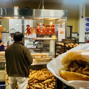 a man holding a sandwich