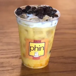 a smoothie in a plastic cup