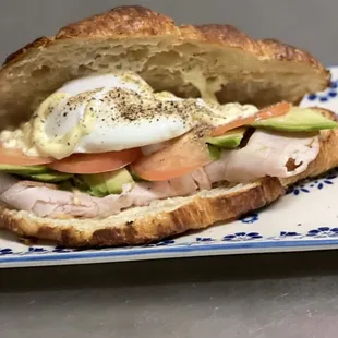 Croissant  with everything on it.