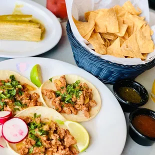 Tamale de Raja (veggies and cheese) and Tacos Al Pastor. Delish!  Leaving me wanting more!!!