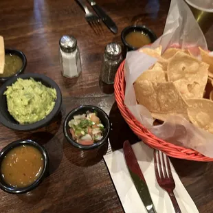 Salsas from the salsas bar with chips and guacamole