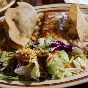 #8 Ocho combination plate: 1 beef taco and 1 cheese enchilada. Rice, beans, salad, soup.