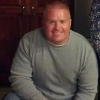 Greg K.