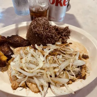 Pollo a la plancha, or chicken grilled on the flat top, with onions (hint of vinegar), and I choose mixed rice and beans and maduros.