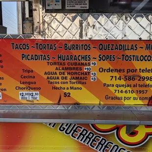 a menu on a food truck