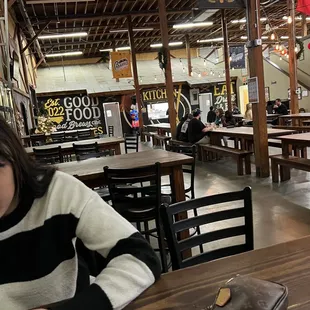 a woman sitting at a table