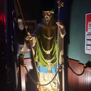 a statue of a man with a sword