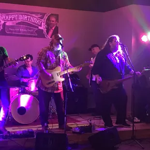 a band performing on stage