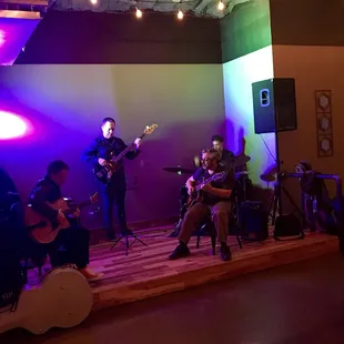 a band playing on stage