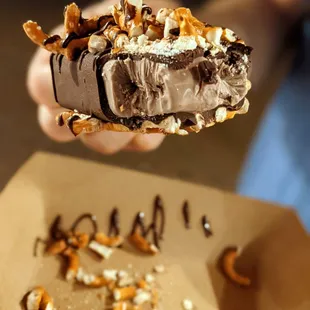 Vegan chocolate pop with dark chocolate dip and pretzels.