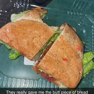 a sandwich in a plastic container