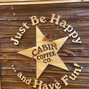 a wooden sign that says just be happy and have fun