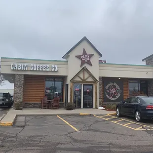 a car parked in front of the building